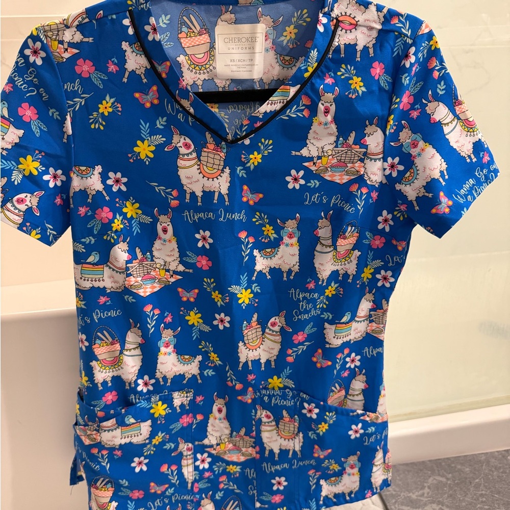Cherokee Blue Scrub Top with Multicolor Llama Print